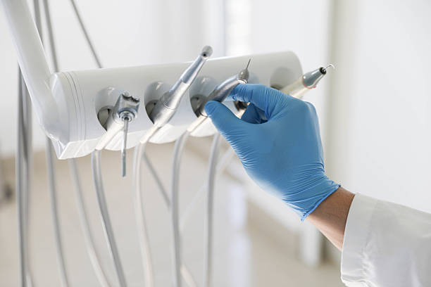 Professional Invisalign Clear Aligners technician working in Glenville, CT